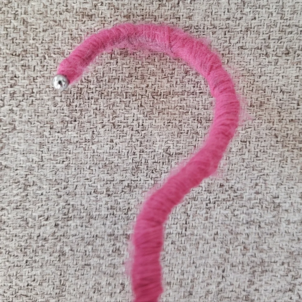 Vintage handmade knit clothing hanger